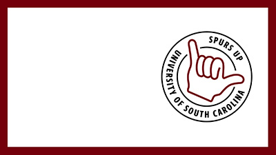 The University of South Carolina Spurs Up stamp on a white background with a garnet border.