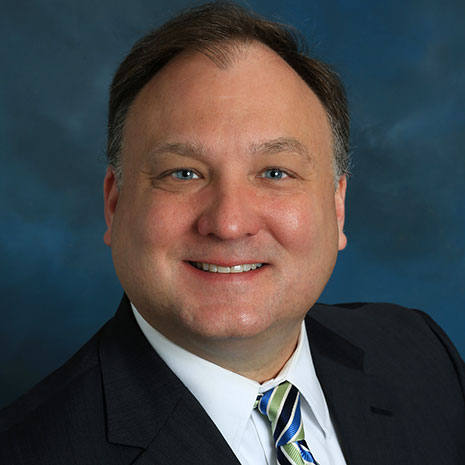 Professional headshot of Scott Verzyl