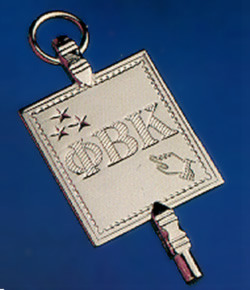 Image of Phi Beta Kappa key against a blue background