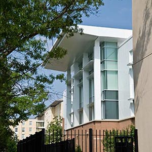 Outside view of the Ernest F. Hollings Library on a sunny day. 