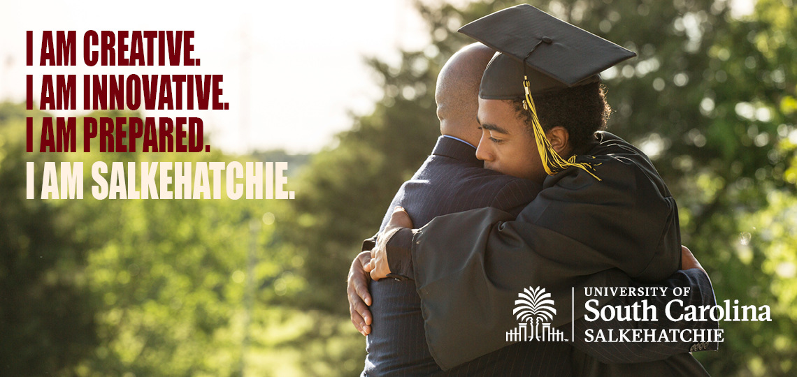 Father and Graduate embrace. I am Salkehatchie.