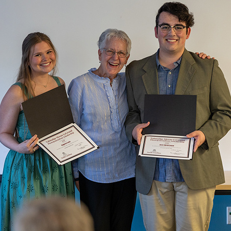 Janet Tarbox and girls holding awards