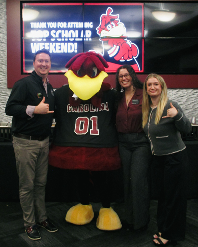 Scholar Programs team with Cocky.