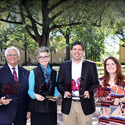 2017 Award Winners 2017 Distinguished Alumni and Friends of the College award winners stand on thoe horseshoe holding their awards
