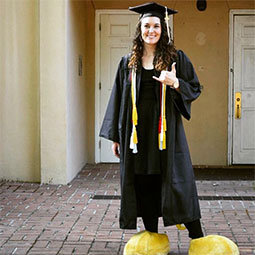 Tara Parker Tara Parker in her cap and gown with her Cocky feet on