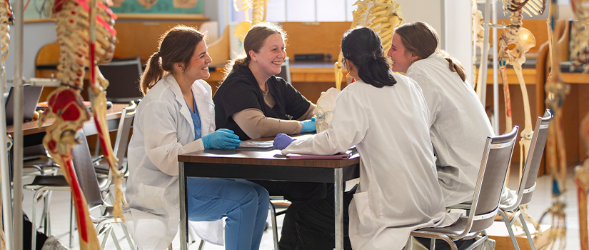 students socializing in a classroom