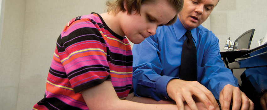 Dr. Price teaching student.