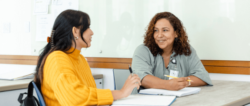 image of young women talking