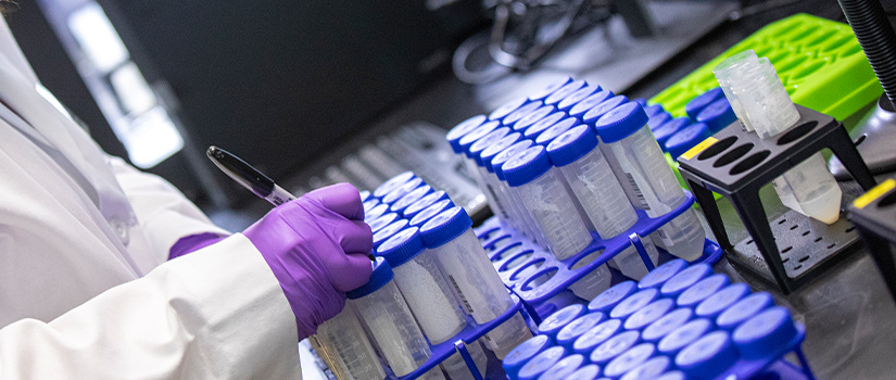 Scientists testing saliva samples