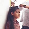 Child getting height measured