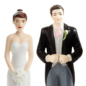 Ceramic traditional bride and groom figurines.