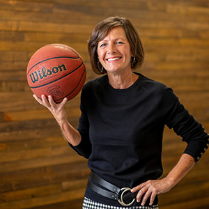 Susan O'Malley portrait holding basketball
