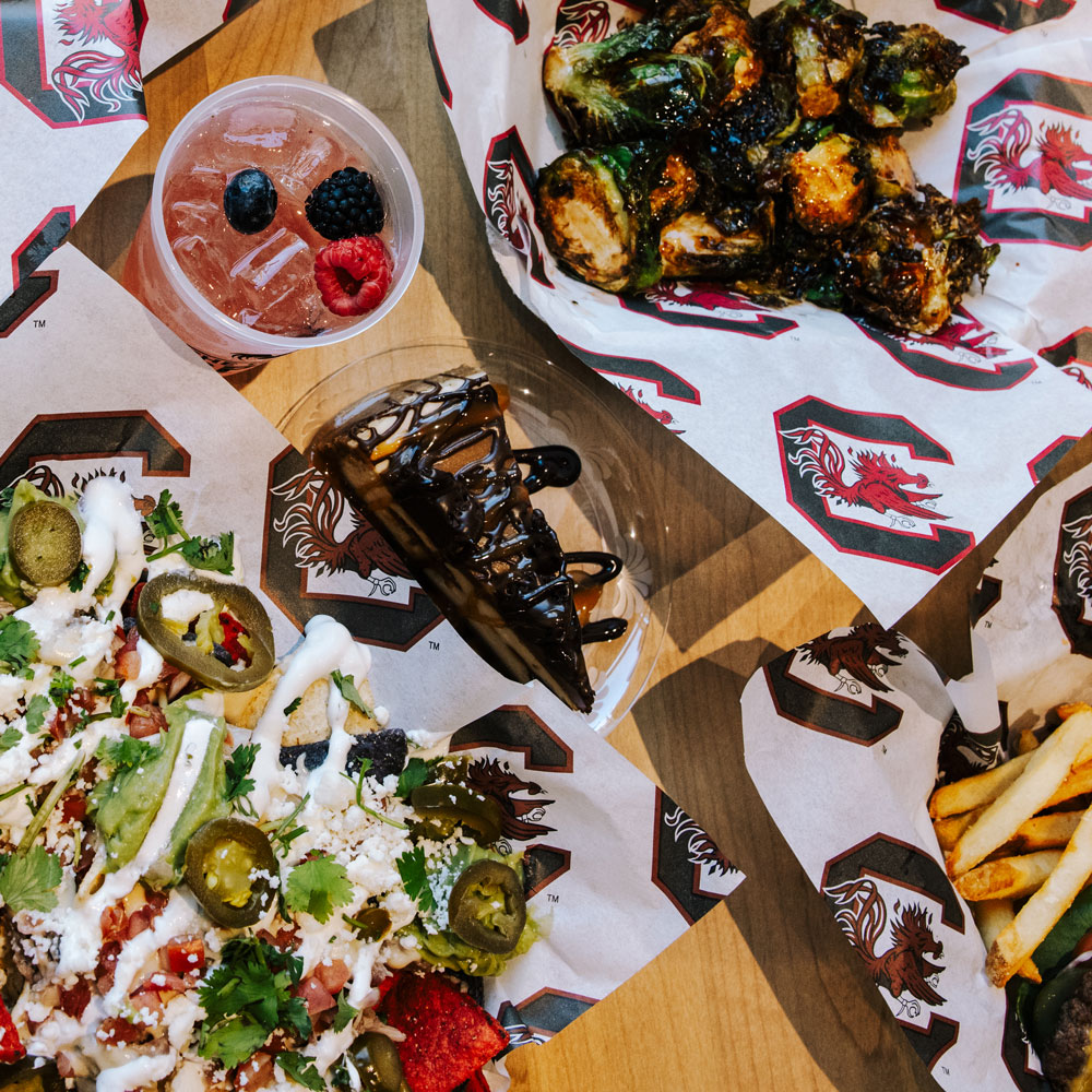 A table covered in multiple dishes from The Spur